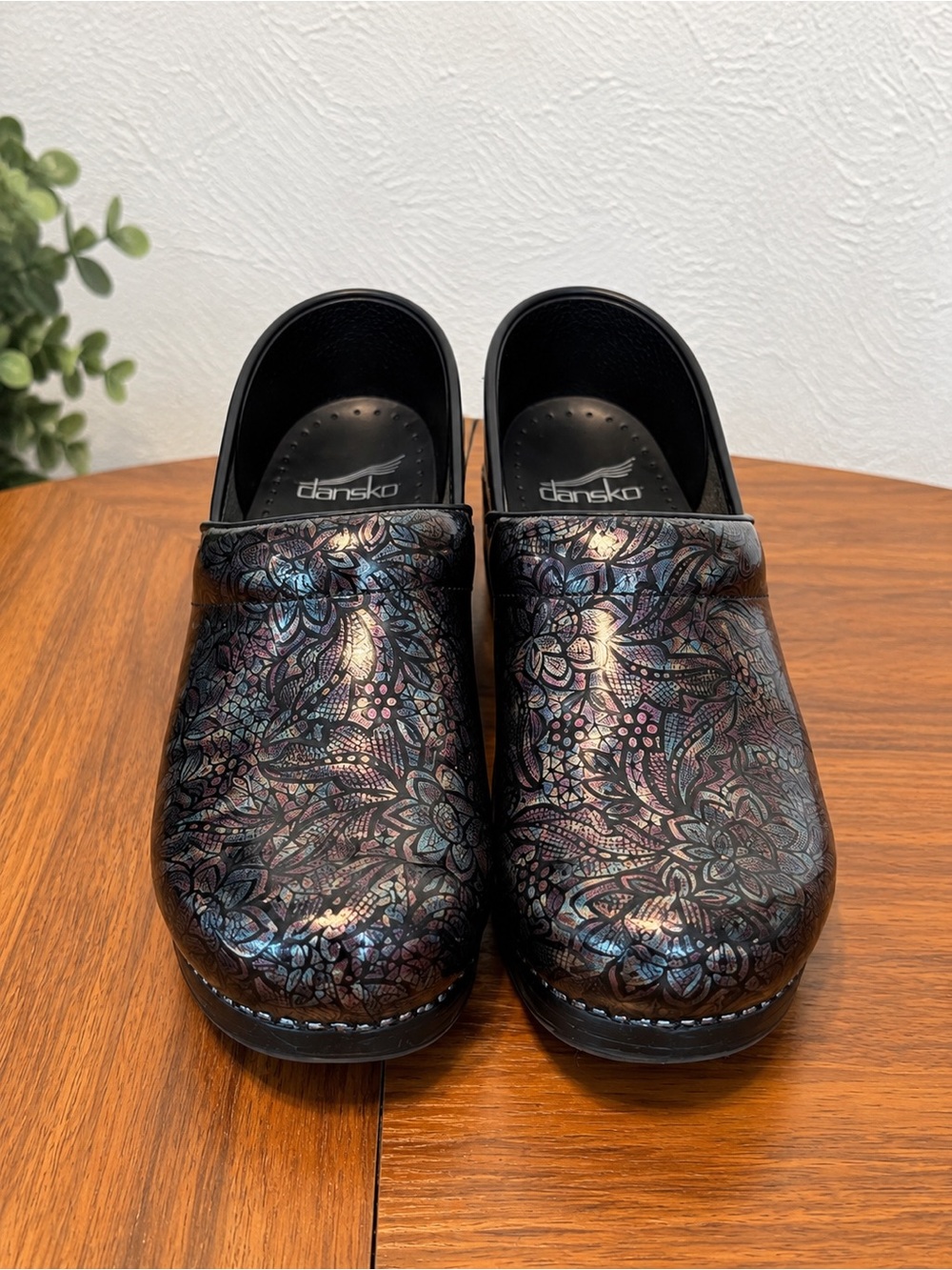 Dansko Iridescent Black Floral-Print Clogs